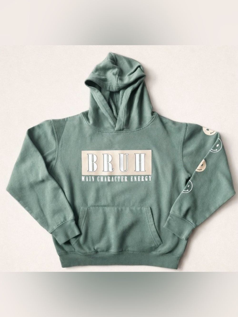 Youth Large Hoodie BRUH Main Character Energy Sage Green Smiley Sleeve Hoodie